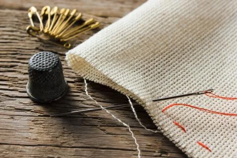 Needle and thimble Stock Photos