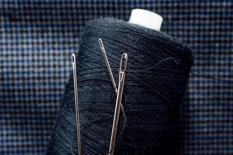 Needle and thread close-up. Macro Stock Photos