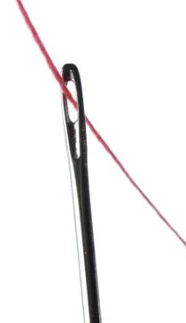 Needle and thread Stock Photos