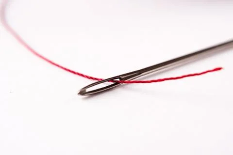 Needle and thread Stock Photos