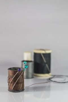 Needle and thread Stock Photos