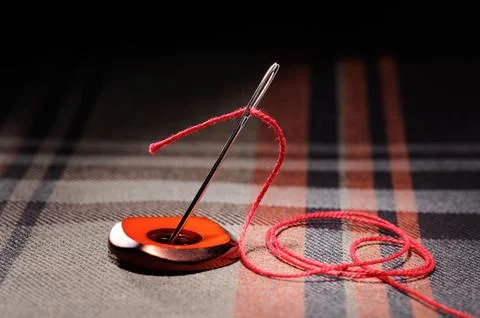 Needle and thread Stock Photos