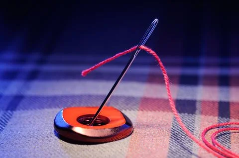 Needle and thread Stock Photos