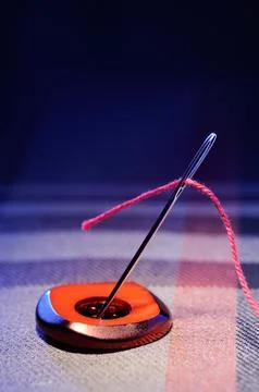 Needle and thread Stock Photos