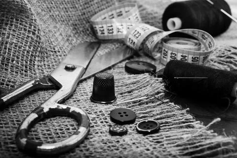 Needle and thread. Scissors Stock Photos