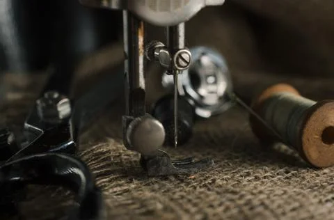 Needle and thread, scissors, sewing machine. Tailor's, fashion designer's Stock Photos