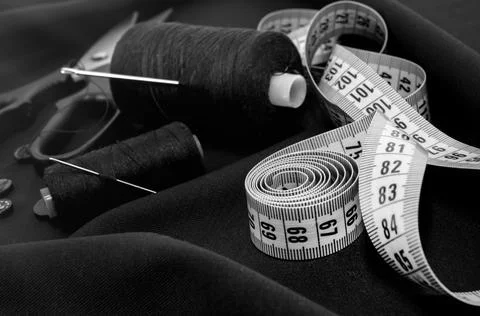 Needle and thread, scissors, sewing machine. Tailor's, fashion designer's, an Stock Photos