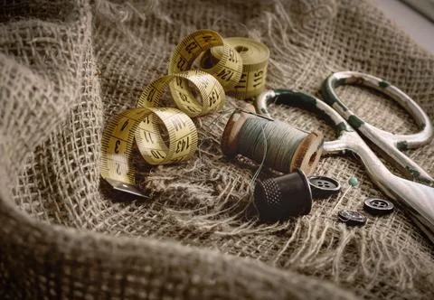 Needle and thread, scissors, sewing machine. Tailor's, fashion designer's Stock Photos