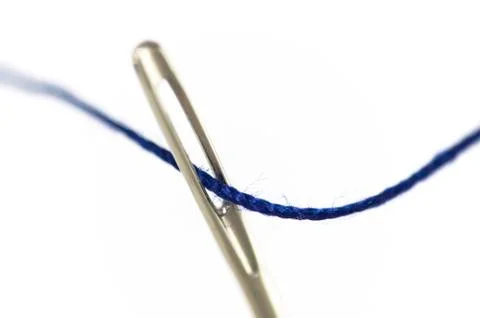 Needle and thread on white background Stock Photos