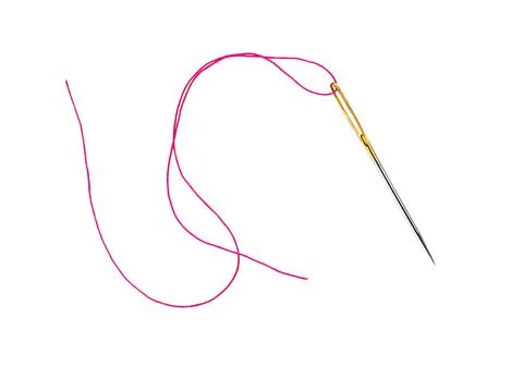 Needle and thread on white background. Stock Photos