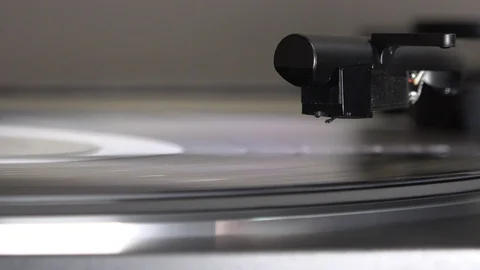Needle Dropping onto Vinyl LP close up Stock Footage 125946390