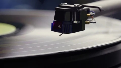 Needle dropping onto vinyl record, close up Stock Footage 79535725