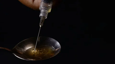 Needle Drug Spoon Video stock 129333265