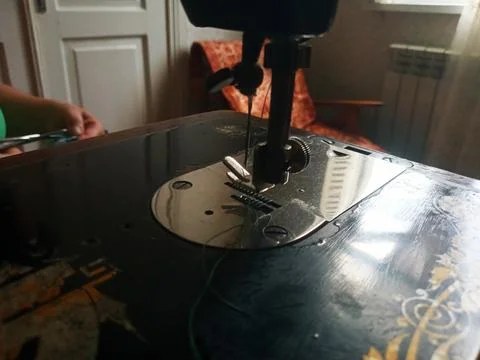 Needle of an old dark sewing machine Foto stock