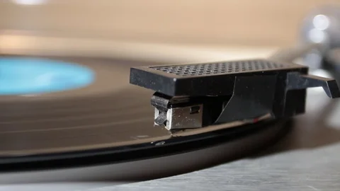 A needle of a record player on a vinyl Stock Footage 116338598
