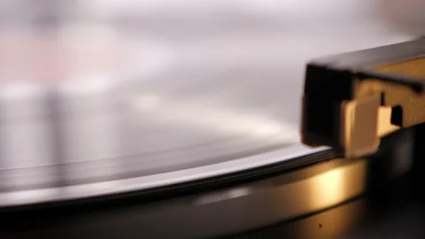 Needle rises on vintage vinyl record. Vinyl retro player spinning. Old turntable Stock Footage 166026256