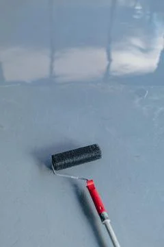 Needle roller for bubbles in the epoxy floor Stock-Fotos