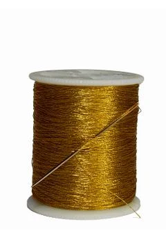 Needle stuck in spool gold thread isolated on white background Stock Photos