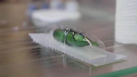 Needle for a tattoo machine and the master prepares a pigment for a tattoo Stock-Footage 168375809