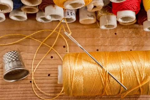 Needle with thread Stock Photos