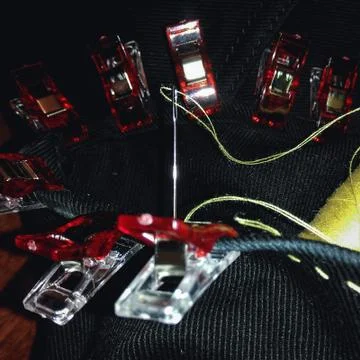 Needle with a thread Stock Photos