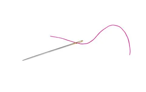 Needle with thread . Stock Photos