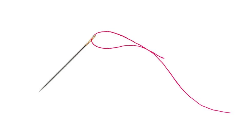 Needle with thread . Stock Photos