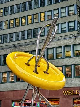 Needle Threading A Button Stock Photos