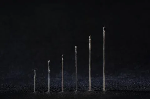 Needles close up on black background 写真素材