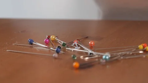 Needles for cloth cutting are on the table - close-up Video stock 102158455