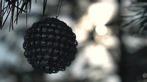 Needles of pine branches and waving gray metallic Christmas tree ball Stock-Footage 87872547