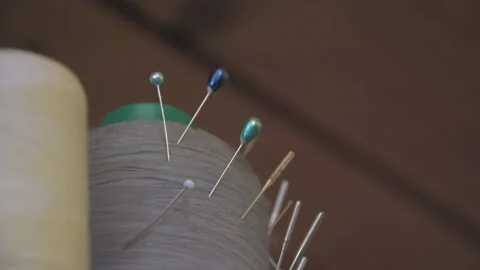 Needles on a sewing thread Video stock 147545707