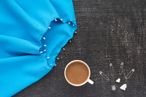 Needlework and coffee on black background Stock Photos