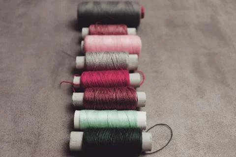 Needlework background with colorful threads Stock Photos