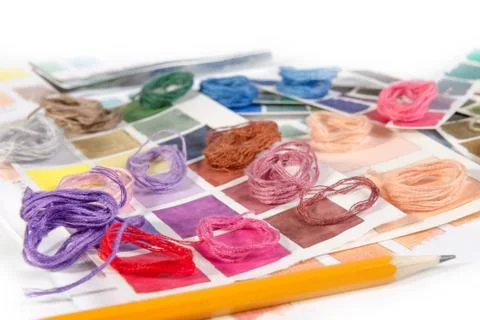 Needlework. embroidery. match colors of thread. Stock Photos