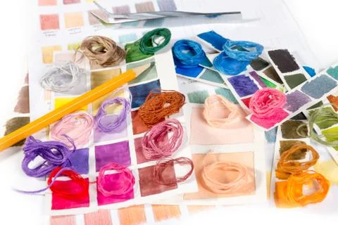 Needlework. embroidery. match colors of thread. Stock Photos