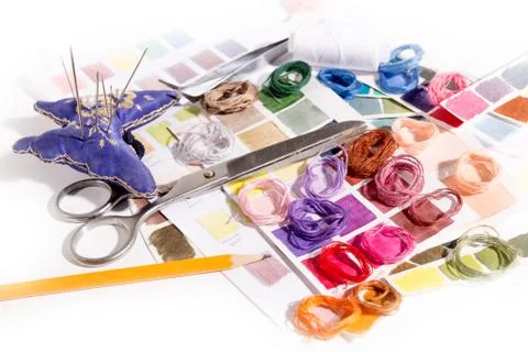 Needlework. embroidery. match colors of thread. Stock Photos