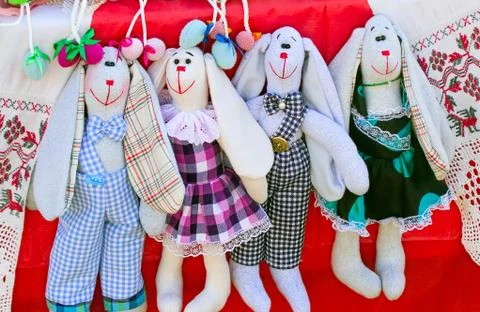 Needlework, original toys in the form of amusing dolls Stock Photos