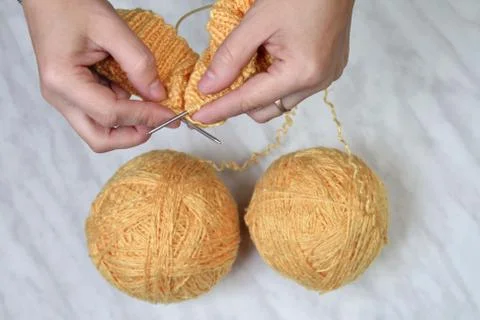 Needlework,knitting on spokes at home Stock Photos