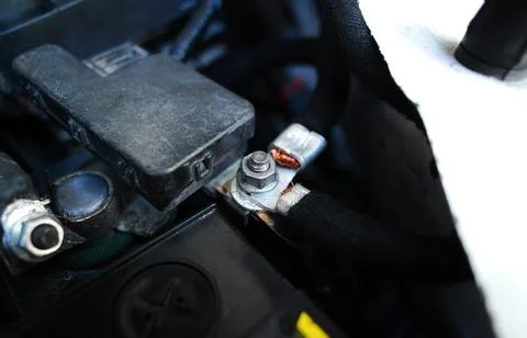 Negative electrode or ground wire on car chassis in engine compartment 스톡 사진