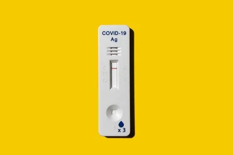 Negative express antigen test for coronavirus covid-19 on yellow background. Stock Photos
