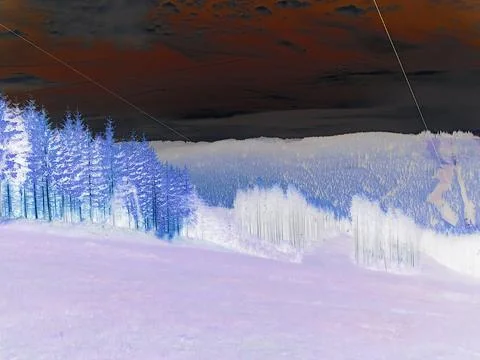 Negative image - Mountainous landscape during sunset. Hills covered by fresh Stock Photos