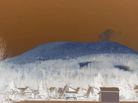 Negative image - Panoramic: snow-covered Ostra Hora hill in Beskydy behind Stock Photos