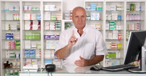 Negative Medication Advice from a Pharmacist Making No Finger Sign and Not Nod Stock Footage 68444266