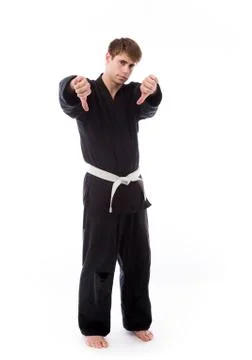Negative model showing thumbs down Stock Photos