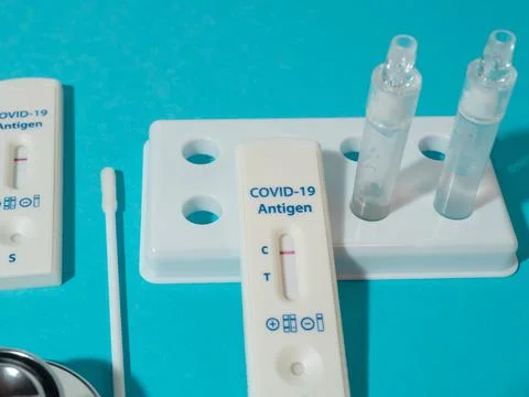 Negative test result using COVID-19 rapid testing device. Stock Photos