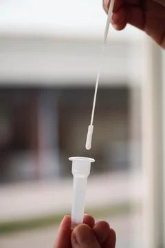 Negative test result using home screening machine for COVID-19 Stock Photos