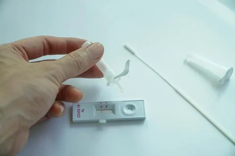 Negative test result using home screening machine for COVID-19 Stock Photos