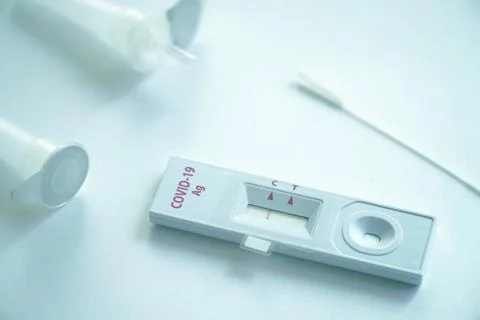 Negative test result using home screening machine for COVID-19 Stock Photos