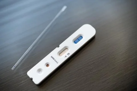 Negative test result by using rapid test device for COVID-19 Stock Photos